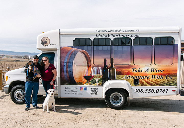 A picture of an Idaho Wine Tours branded bus